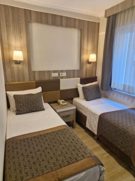 Iki Ayrı Yataklı Oda, Bahçe Manzaralı